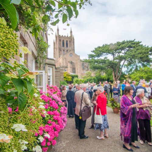 People socialising outside Bishops Palace
