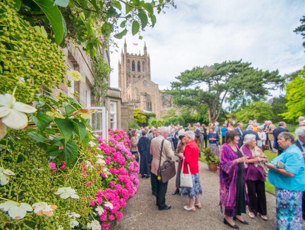 People socialising outside Bishops Palace