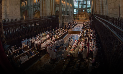 An image of evensong at Gloucester Cathedral.