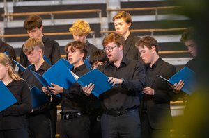 Youth Choir members singing on stage