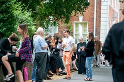 People socialising in the Festival Village