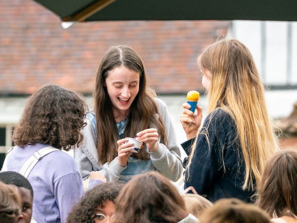 Young people enjoying the Festival Village